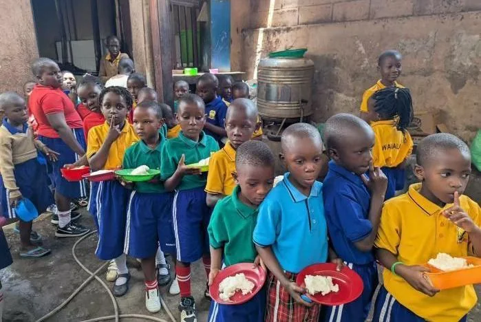 School children receiving a nutritious meal